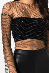 Close-up of the sparkling embellishments on the sheer crop top.