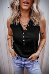 Woman wearing a black sleeveless V-neck top with a button-up front and a chest pocket.