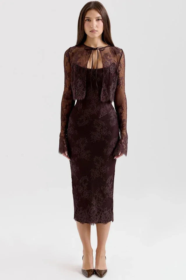 Woman wearing a dark brown lace midi dress with a matching long-sleeved lace bolero jacket