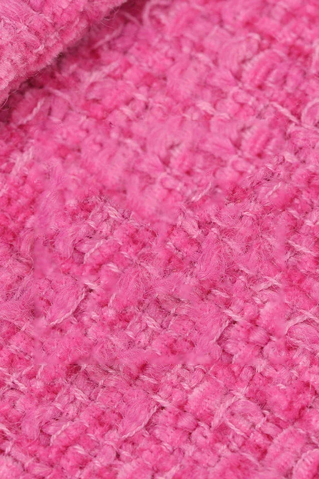 Close-up of the textured pink tweed fabric