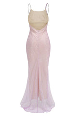 A sparkling lavender floor-length gown with a cowl neckline and spaghetti straps, back studio shot.