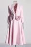 Pink blazer and skirt set with rose embellishments displayed on a mannequin