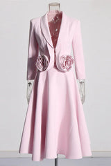 Pink blazer and skirt set with rose embellishments displayed on a mannequin