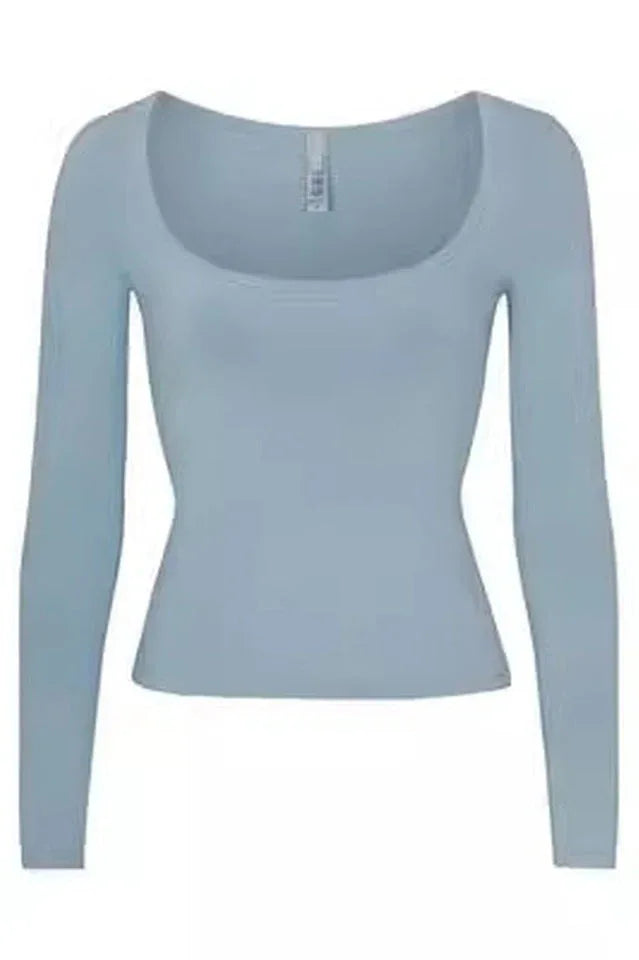 Light blue long-sleeve cropped top with a square neckline, front view.