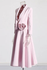 Side view of a pink blazer and skirt set with rose embellishments on a mannequin