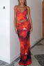 Woman in a red floral print two-piece set