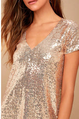 close-up of the gold sequin fabric on the dress