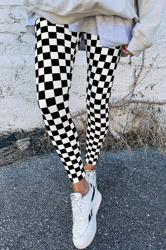 Leggings with a black and white checkerboard pattern