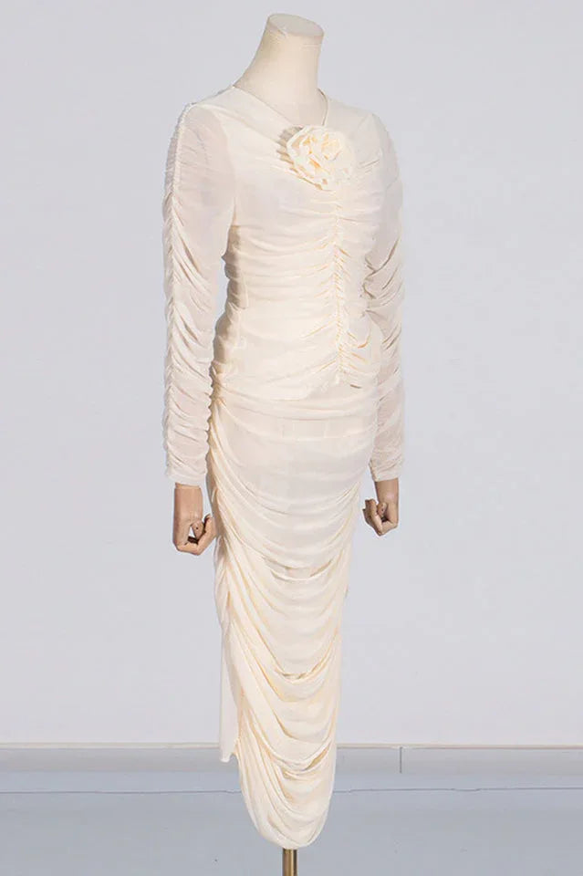 Front view of a cream ruched mesh dress on a mannequin