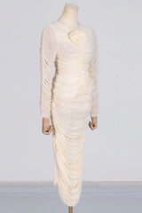 Front view of a cream ruched mesh dress on a mannequin