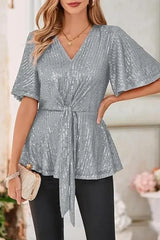 Silver sequined V-neck top with flutter sleeves and tie-front detail