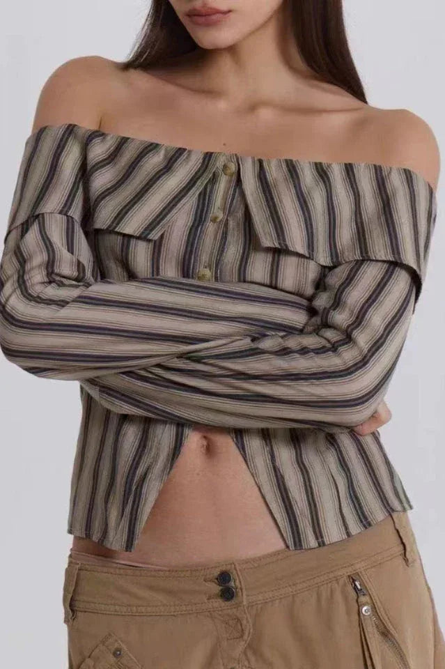 Close-up of a model's midriff showing the detail of an off-the-shoulder striped top