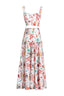Front view of a white seashell print cropped halter top and a tiered maxi skirt.