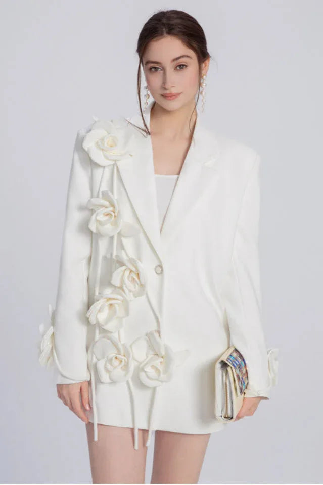 Front view of a white floral blazer dress
