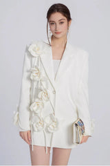 Front view of a white floral blazer dress