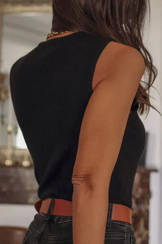 back view of a woman wearing a black sleeveless bodysuit