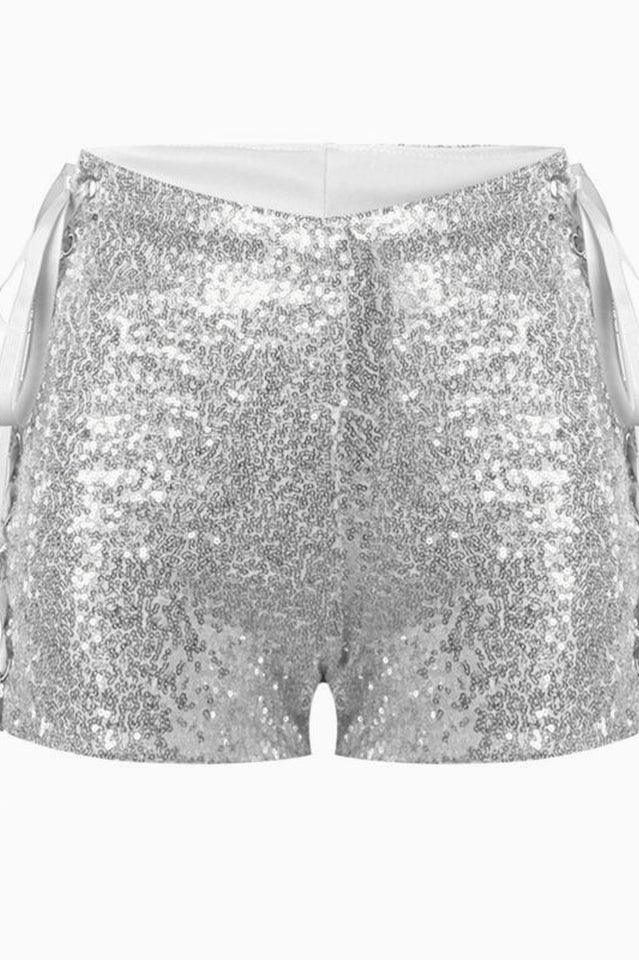 Front view of silver sequined shorts, showing the high-waisted design and lace-up detail.