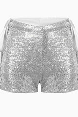Front view of silver sequined shorts, showing the high-waisted design and lace-up detail.