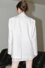 Back view of a white blazer.