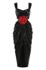 Full view of a black sequined gown with a sweetheart neckline, cut-out waist, and draped skirt.