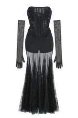 Black lace corset gown with sheer skirt and long sleeves laid flat