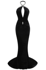 Front view of a black velvet mermaid gown with a deep V-neck and embellished halter neckline.