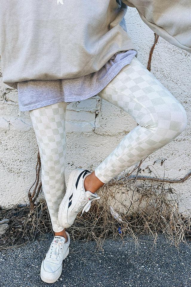 Close-up of pastel checkerboard leggings