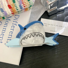 Blue novelty shark acetate hair claw clip with pearlescent white belly and open mouth detail - View 6 | TEVQA