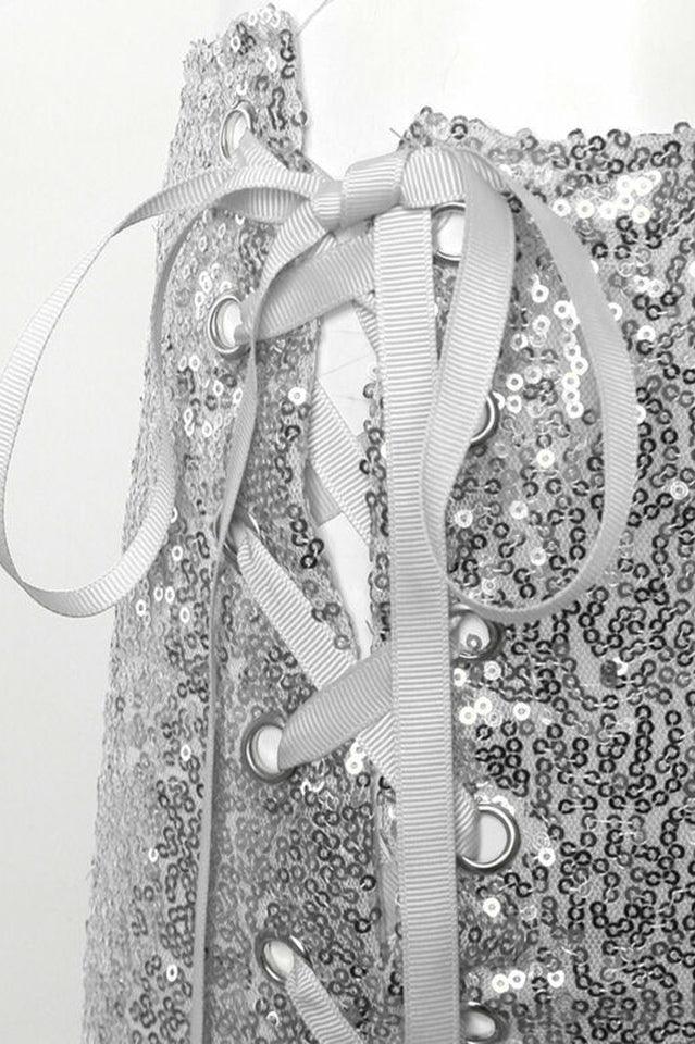 Close-up of the white ribbon lacing through silver eyelets on the side of the sequined shorts.