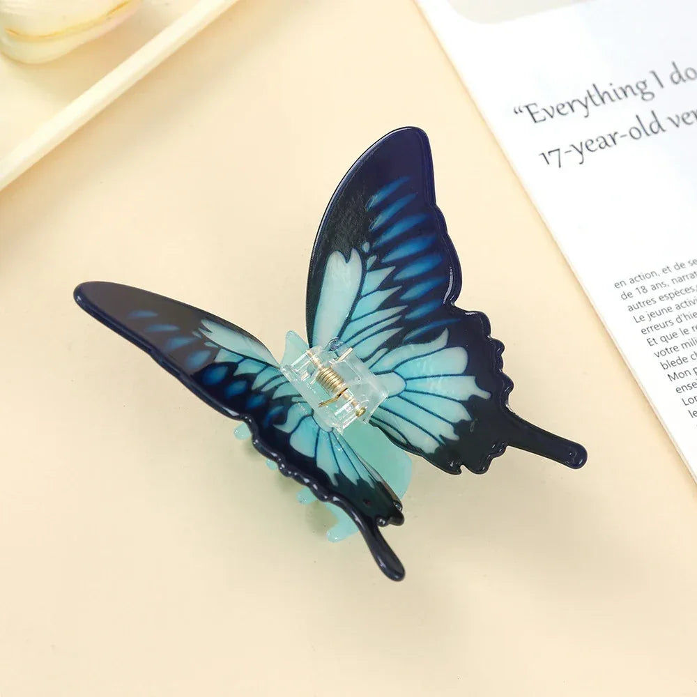 Detailed view of a blue butterfly hair claw clip