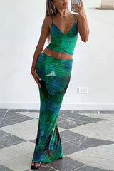 Woman in a green floral print two-piece set