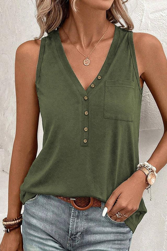 Woman wearing a green sleeveless V-neck top with a button-up front and a chest pocket.