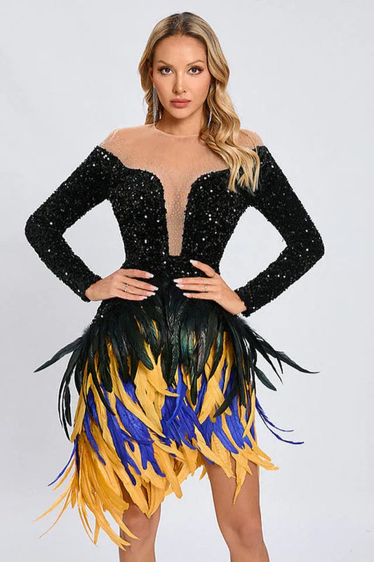 Woman posing in a black sequined dress with a multi-colored feather skirt