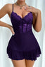 Woman wearing a purple lace and mesh chemise with ruffle hem