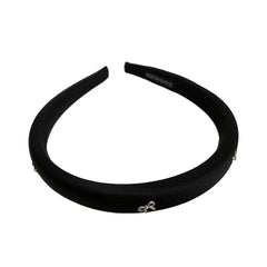 Black padded headband with bow embellishments