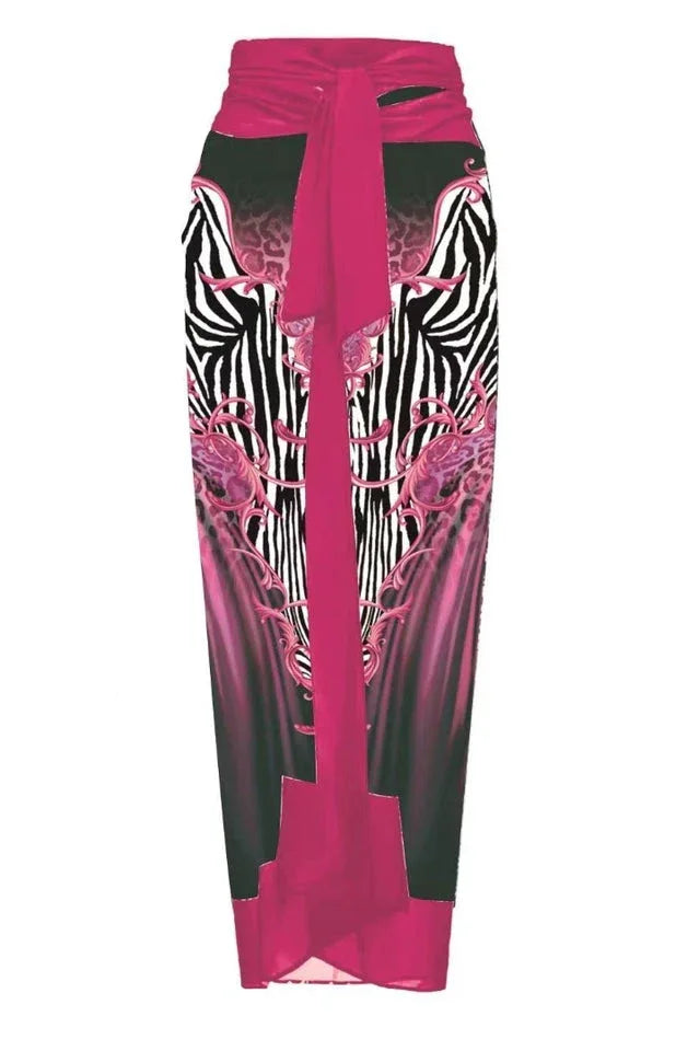 One shoulder swimsuit with tropical print and floral applique, paired with a matching skirt. - View 17 | TEVQA