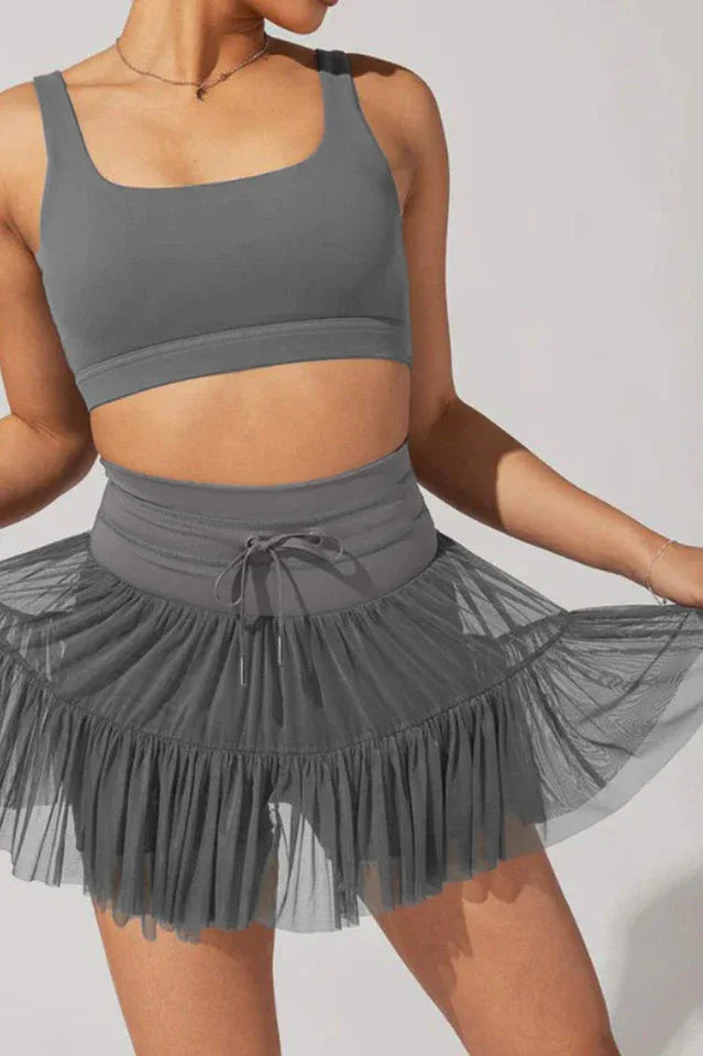 Close-up of ruffled tulle skirt with drawstring waist