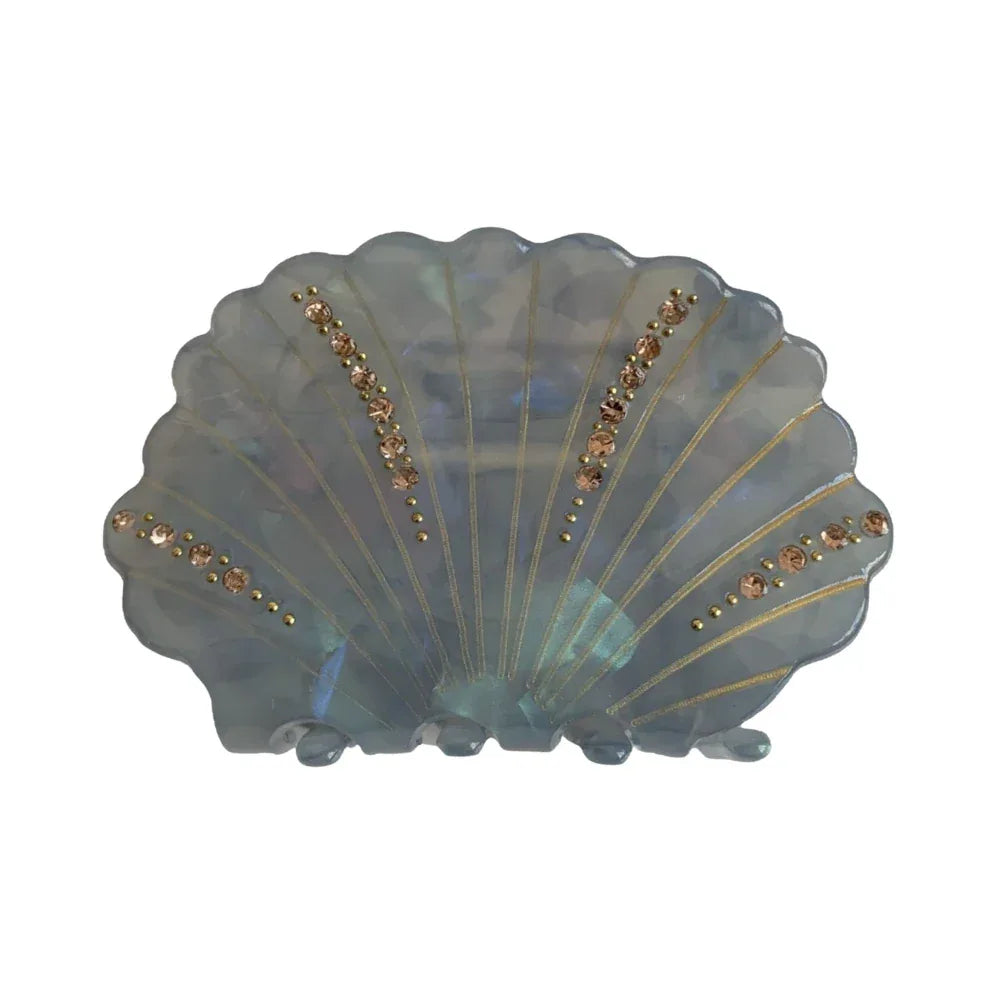 Iridescent seashell hair claw with gold detailing and rhinestones