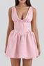 Pink sleeveless V-neck dress with a fitted bodice and flared skirt, front view