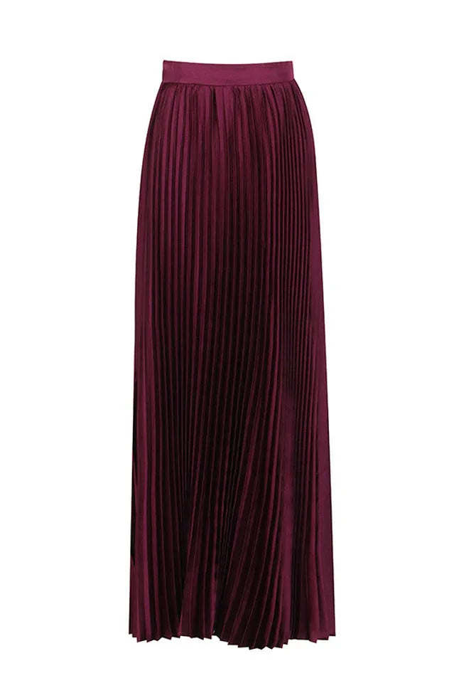 Close-up of a burgundy pleated maxi skirt.