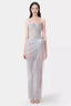 Model wearing a light blue sheer tulle gown with a one-shoulder design and corset bodice.
