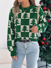 Woman with a handbag and a green and white checkered Christmas tree sweater