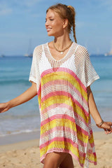 Close-up of a woman wearing a colorful striped crochet knit kaftan