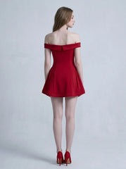 Back view of a woman in a red off-the-shoulder mini dress