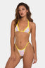 Woman wearing a yellow bikini with floral print and white accents.