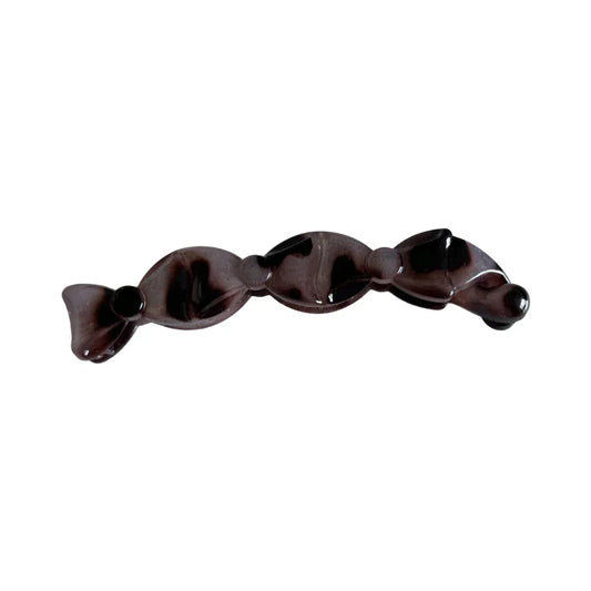 a single brown and black marbled candy-shaped hair clip