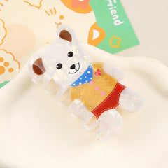 White iridescent bear-shaped hair claw clip with a detailed outfit