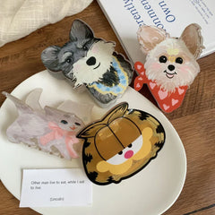 Set of animal-themed hair claw clips including Garfield, a schnauzer, a terrier, and a cat