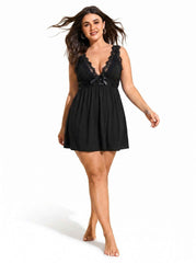 Woman wearing a black lace-trimmed babydoll nightgown walking