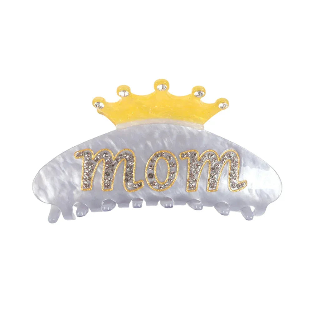 Grey and white marbled claw clip with 'Mom' and a yellow crown